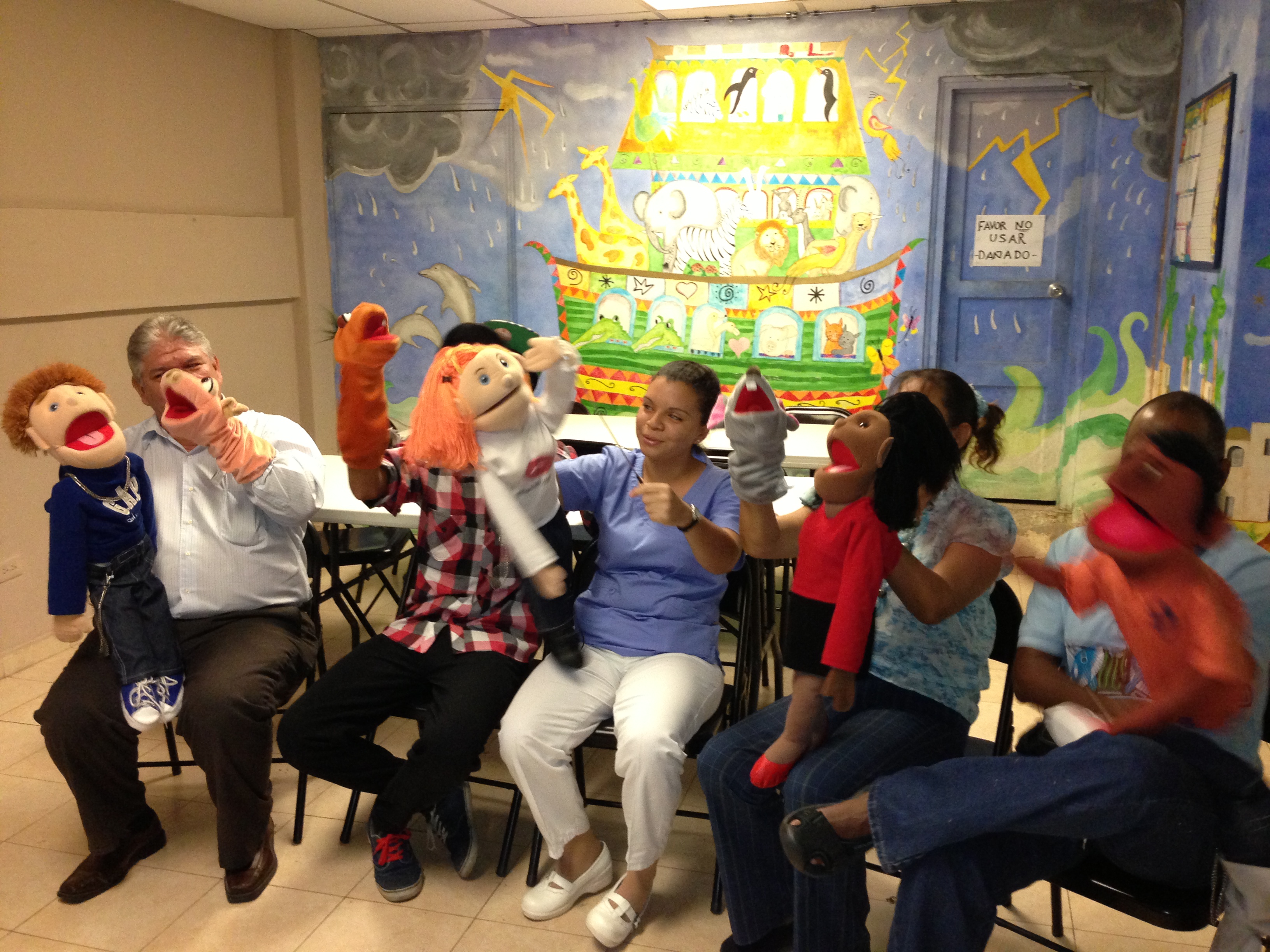 Volunteers at the Calidonia Youth Outreach Center in Panama City practice for a traveling puppet show.